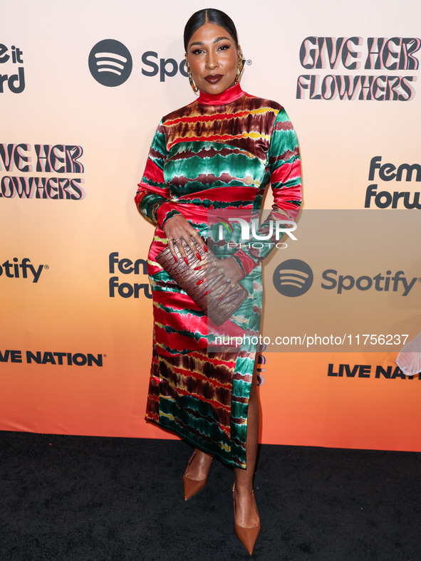 Melanie Fiona arrives at the 3rd Annual Femme It Forward 'Give Her FlowHERS' Awards Gala 2024 held at The Beverly Hilton Hotel on November 8...