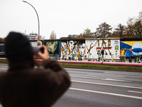  People visit East Side Gallery a day ahead of the 35th anniversary of the fall of the Berlin Wall. Berlin, Germany on 8 November, 2024. (