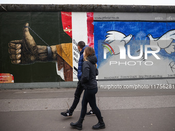  People visit East Side Gallery a day ahead of the 35th anniversary of the fall of the Berlin Wall. Berlin, Germany on 8 November, 2024. (