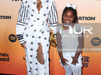 LisaRaye McCoy and daughter Bella Rae arrive at the 3rd Annual Femme It Forward 'Give Her FlowHERS' Awards Gala 2024 held at The Beverly Hil...