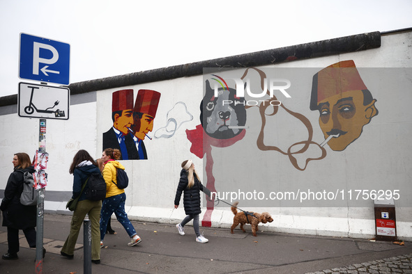  People visit East Side Gallery a day ahead of the 35th anniversary of the fall of the Berlin Wall. Berlin, Germany on 8 November, 2024. 