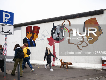  People visit East Side Gallery a day ahead of the 35th anniversary of the fall of the Berlin Wall. Berlin, Germany on 8 November, 2024. (