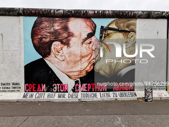  Iconic 'Kiss' mural East Side Gallery a day ahead of the 35th anniversary of the fall of the Berlin Wall. Berlin, Germany on 8 November, 20...