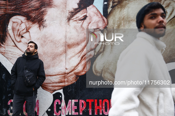  Iconic 'Kiss' mural East Side Gallery a day ahead of the 35th anniversary of the fall of the Berlin Wall. Berlin, Germany on 8 November, 20...