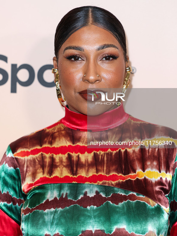 Melanie Fiona arrives at the 3rd Annual Femme It Forward 'Give Her FlowHERS' Awards Gala 2024 held at The Beverly Hilton Hotel on November 8...