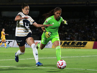 Stephanie Ribeiro #7 of Pumas Femenil and goalkeeper Aurora Santiago #1 of Tigres Femenil fight for the ball during the first leg quarter-fi...