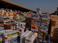 Labourers load apple boxes onto trucks, which are sent to different parts of the country from Asia's second-largest fruit mandi in Sopore, J...