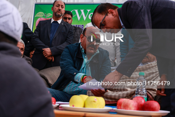 Deputy Chief Minister Surinder Kumar Choudhary is pictured during a program at Asia's second largest fruit mandi in Sopore, Jammu and Kashmi...