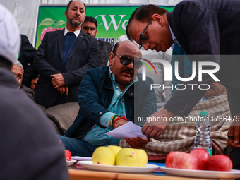 Deputy Chief Minister Surinder Kumar Choudhary is pictured during a program at Asia's second largest fruit mandi in Sopore, Jammu and Kashmi...