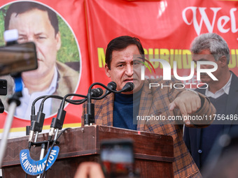 National Conference Leader and Minister Javid Ahmad Dar speaks during a program at Asia's second largest fruit market in Sopore, Jammu and K...