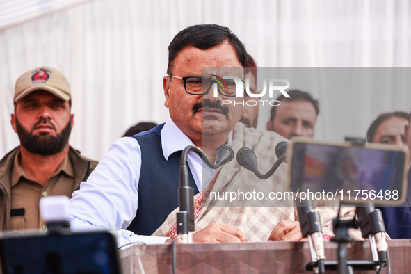 National Conference senior leader and Minister Javed Ahmad Rana speaks during a program at Asia's second largest fruit market in Sopore, Jam...