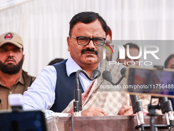 National Conference senior leader and Minister Javed Ahmad Rana speaks during a program at Asia's second largest fruit market in Sopore, Jam...