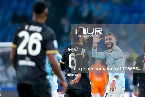 Taty Castellanos of SS Lazio greets  Yerry Mina of Cagliari Calcio as he leaves the pitch receiving a red card during the Serie A Enilive ma...