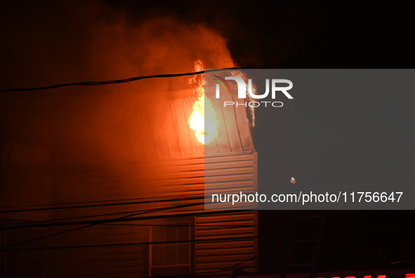 Flames erupt from multiple stores on John F. Kennedy Boulevard and reach 4-alarms as firefighters continue to battle numerous fires around t...