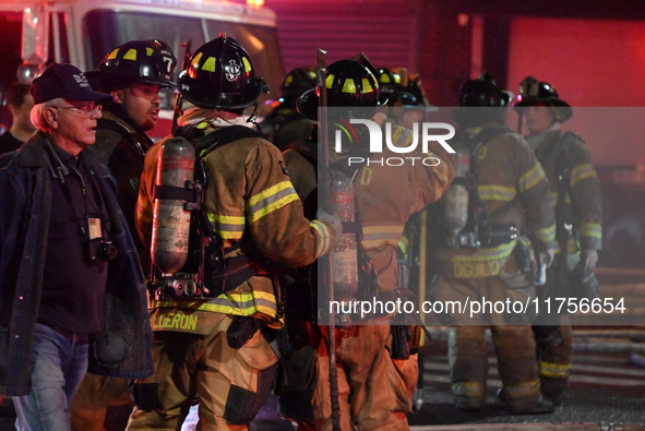 Flames erupt from multiple stores on John F. Kennedy Boulevard and reach 4-alarms as firefighters continue to battle numerous fires around t...