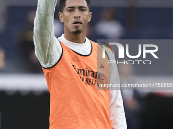 Jude Bellingham of Real Madrid greets fans during the La Liga 2024/25 match between Real Madrid and Osasuna at Santiago Bernabeu Stadium in...