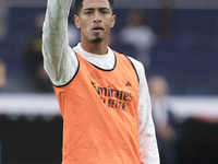 Jude Bellingham of Real Madrid greets fans during the La Liga 2024/25 match between Real Madrid and Osasuna at Santiago Bernabeu Stadium in...