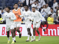 Rodrygo Goes, Jude Bellingham, Vinicius Jr, and Kylian Mbappe of Real Madrid warm up during the La Liga 2024/25 match between Real Madrid an...