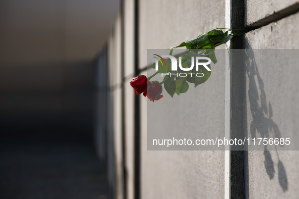 Flowers at Berlin Wall Memorial after the commemoration ceremony marking the 35th anniversary of the fall of the Berlin Wall. Berlin, German...