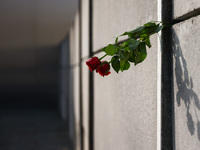 Flowers at Berlin Wall Memorial after the commemoration ceremony marking the 35th anniversary of the fall of the Berlin Wall. Berlin, German...