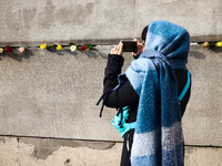 Flowers at Berlin Wall Memorial after the commemoration ceremony marking the 35th anniversary of the fall of the Berlin Wall. Berlin, German...