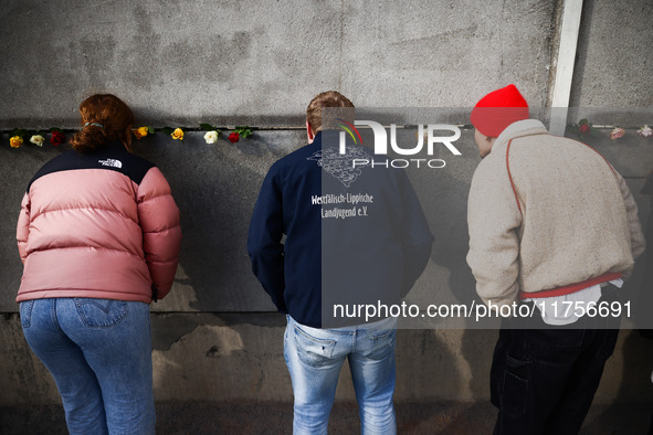 Flowers at Berlin Wall Memorial after the commemoration ceremony marking the 35th anniversary of the fall of the Berlin Wall. Berlin, German...