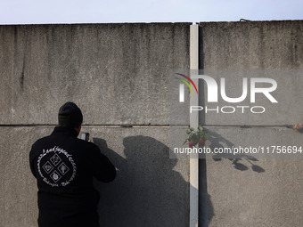 Flowers at Berlin Wall Memorial after the commemoration ceremony marking the 35th anniversary of the fall of the Berlin Wall. Berlin, German...