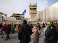 Flowers at Berlin Wall Memorial after the commemoration ceremony marking the 35th anniversary of the fall of the Berlin Wall. Berlin, German...