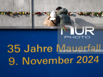 Flowers at Berlin Wall Memorial after the commemoration ceremony marking the 35th anniversary of the fall of the Berlin Wall. Berlin, German...