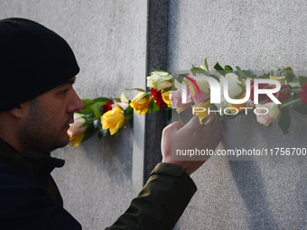 Flowers at Berlin Wall Memorial after the commemoration ceremony marking the 35th anniversary of the fall of the Berlin Wall. Berlin, German...