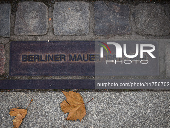 A plaque at Berlin Wall Memorial during the commemoration ceremony marking the 35th anniversary of the fall of the Berlin Wall. Berlin, Germ...