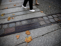 A plaque at Berlin Wall Memorial during the commemoration ceremony marking the 35th anniversary of the fall of the Berlin Wall. Berlin, Germ...