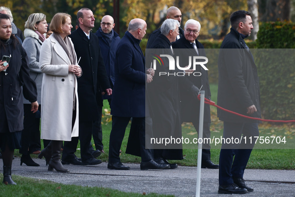 German President Frank-Walter Steinmeier, Berlin mayor Kai Wegner and pastor Thomas Jeutner attend the commemoration ceremony at Berlin Wall...