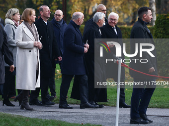 German President Frank-Walter Steinmeier, Berlin mayor Kai Wegner and pastor Thomas Jeutner attend the commemoration ceremony at Berlin Wall...