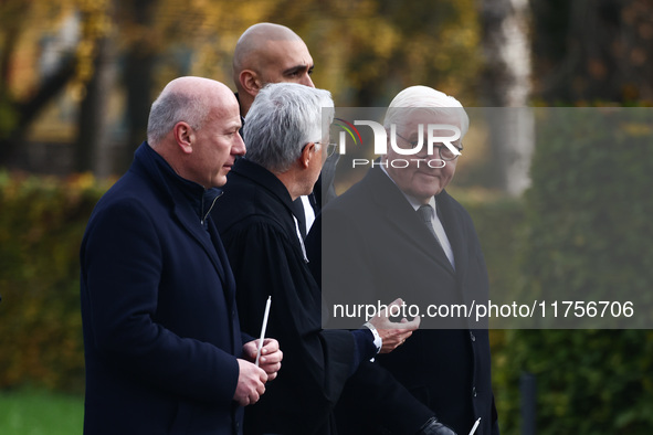 German President Frank-Walter Steinmeier, Berlin mayor Kai Wegner and pastor Thomas Jeutner attend the commemoration ceremony at Berlin Wall...