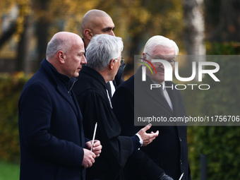 German President Frank-Walter Steinmeier, Berlin mayor Kai Wegner and pastor Thomas Jeutner attend the commemoration ceremony at Berlin Wall...