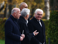 German President Frank-Walter Steinmeier, Berlin mayor Kai Wegner and pastor Thomas Jeutner attend the commemoration ceremony at Berlin Wall...