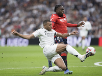 In Madrid, Spain, on November 9, Kylian Mbappe of Real Madrid attempts a shot during the La Liga 2024/25 match between Real Madrid and Osasu...