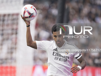 Rodrygo Goes of Real Madrid takes the ball with his hands during the La Liga 2024/25 match between Real Madrid and Osasuna at Santiago Berna...