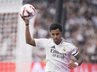 Rodrygo Goes of Real Madrid takes the ball with his hands during the La Liga 2024/25 match between Real Madrid and Osasuna at Santiago Berna...