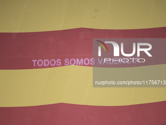 A flag of the Valencian community is displayed at the Santiago Bernabeu in Madrid, Spain, on November 9, as a tribute to those who died in t...