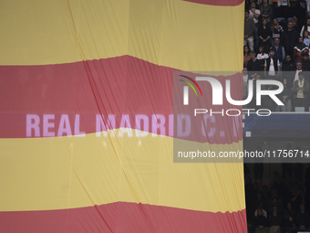 A flag of the Valencian community is displayed at the Santiago Bernabeu in Madrid, Spain, on November 9, as a tribute to those who died in t...