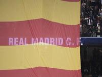 A flag of the Valencian community is displayed at the Santiago Bernabeu in Madrid, Spain, on November 9, as a tribute to those who died in t...