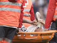 Eder Militao of Real Madrid is injured during the La Liga 2024/25 match between Real Madrid and Osasuna at Santiago Bernabeu Stadium in Madr...