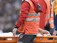 Eder Militao of Real Madrid is injured during the La Liga 2024/25 match between Real Madrid and Osasuna at Santiago Bernabeu Stadium in Madr...