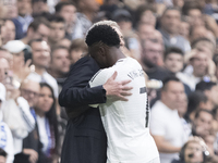 Vinicius Jr of Real Madrid celebrates a goal with Real Madrid coach Carlo Ancelotti during the La Liga 2024/25 match between Real Madrid and...