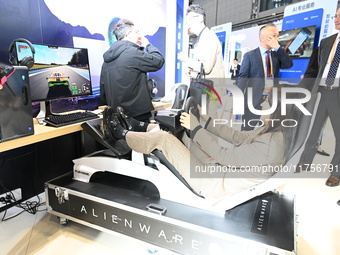 Visitors explore Hexagon's new technologies, achievements, and exhibits in the technical equipment exhibition area of the 7th China Internat...