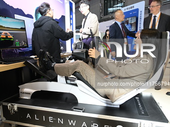 Visitors explore Hexagon's new technologies, achievements, and exhibits in the technical equipment exhibition area of the 7th China Internat...