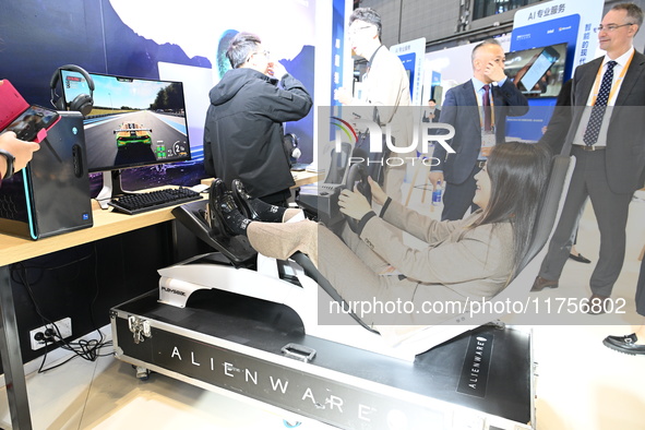 Visitors explore Hexagon's new technologies, achievements, and exhibits in the technical equipment exhibition area of the 7th China Internat...