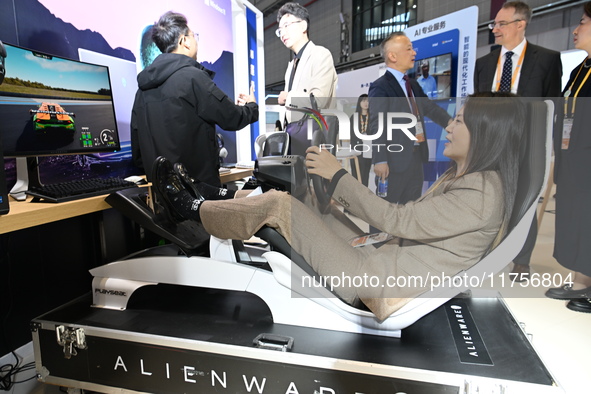 Visitors explore Hexagon's new technologies, achievements, and exhibits in the technical equipment exhibition area of the 7th China Internat...